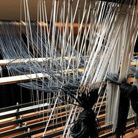 Setting up a loom to weave