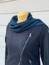 Load image into Gallery viewer, Closer picture of a blue and black handwoven scarf with fringe on mannequin 